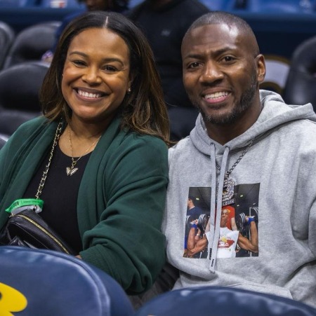 Yonka Clark with her husband at the match of the Super Bowl Championship.